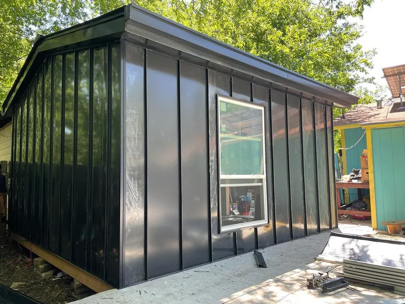 Black standing seam metal wall panels for Metal Roof Installation in Bessemer