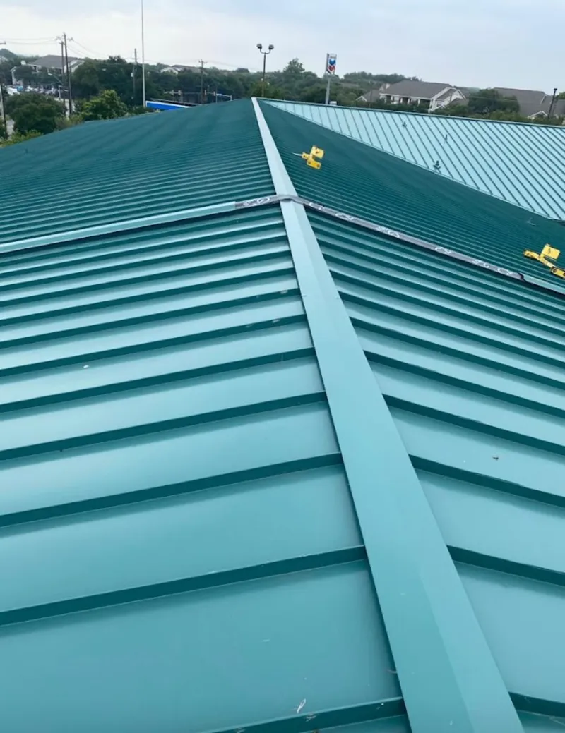 Green commercial metal roof ridge and valley for Metal Roof Repair in Bessemer