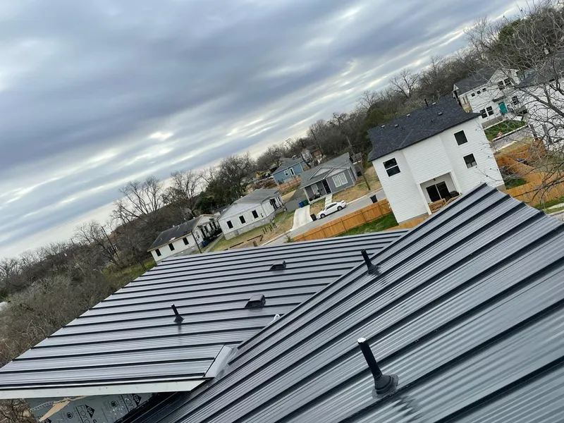 Standing seam metal roof panels with vents for Skylight Repair in Bessemer